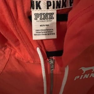 Victoria Secret- Pink light zip up in Coral.